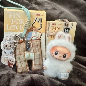 Popmart Pin For Love H Plushie with Letter H pendant.